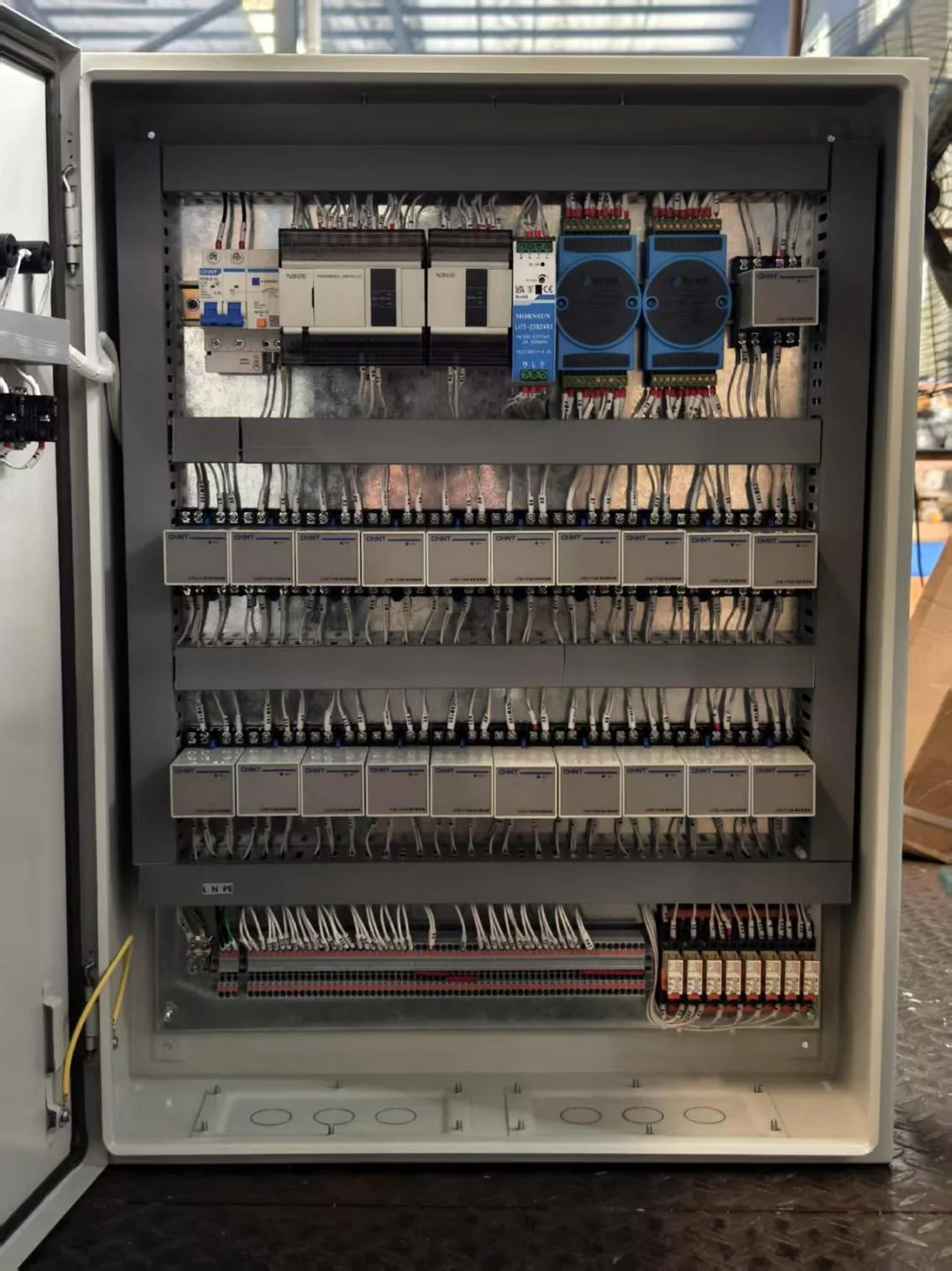 Electrical control cabinet with wiring, terminals and control components